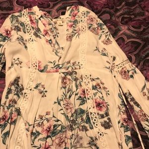 Adam Levine flower pattern blouse.